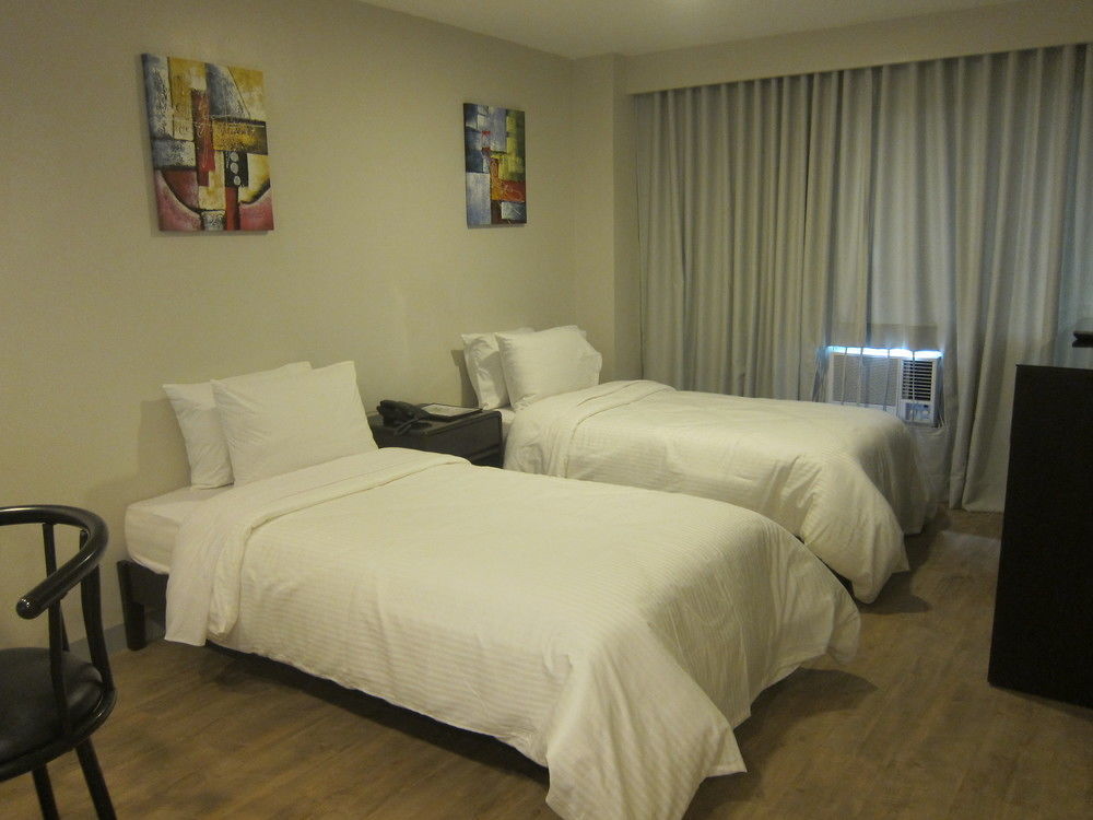 Готель The Charter House Makati City Екстер'єр фото